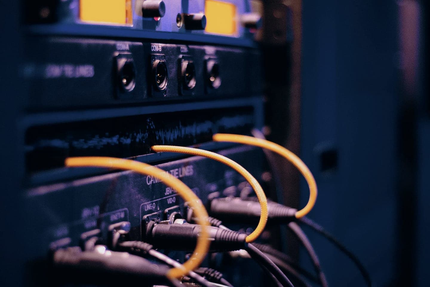 Network cables connected to rack equipment in a server room